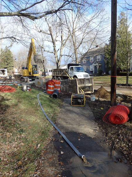 excavation on Elmwood
St to install new water main showing pump effluent from
saturated sand of the top of the water table