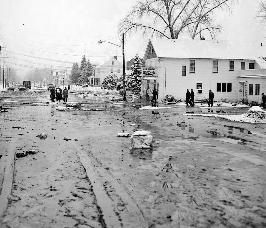 view
east along Western Avenue flood debris cleanup 21 March 1963
